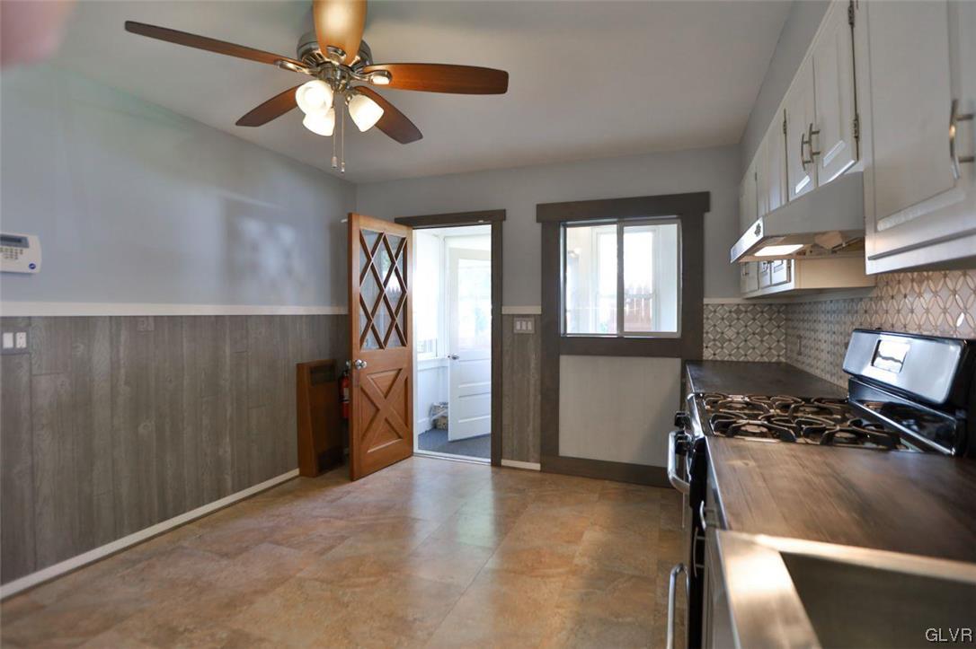 12 B Street Pen Argyl, PA 18072 - Photo 33 of 50 a kitchen with a stove and a refrigerator