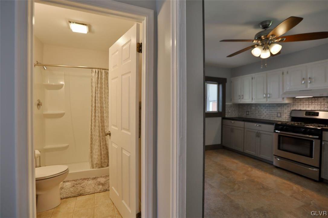 12 B Street Pen Argyl, PA 18072 - Photo 36 of 50 a view of a bathroom with a shower a toilet and a sink