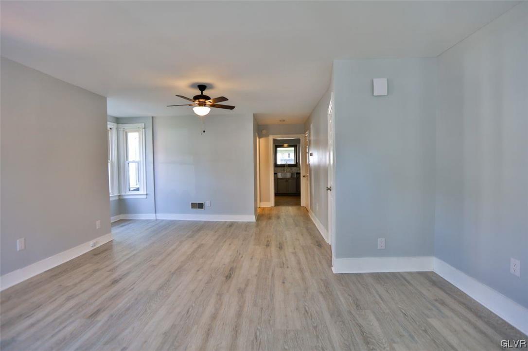 12 B Street Pen Argyl, PA 18072 - Photo 4 of 50 wooden floor in an empty room with a window