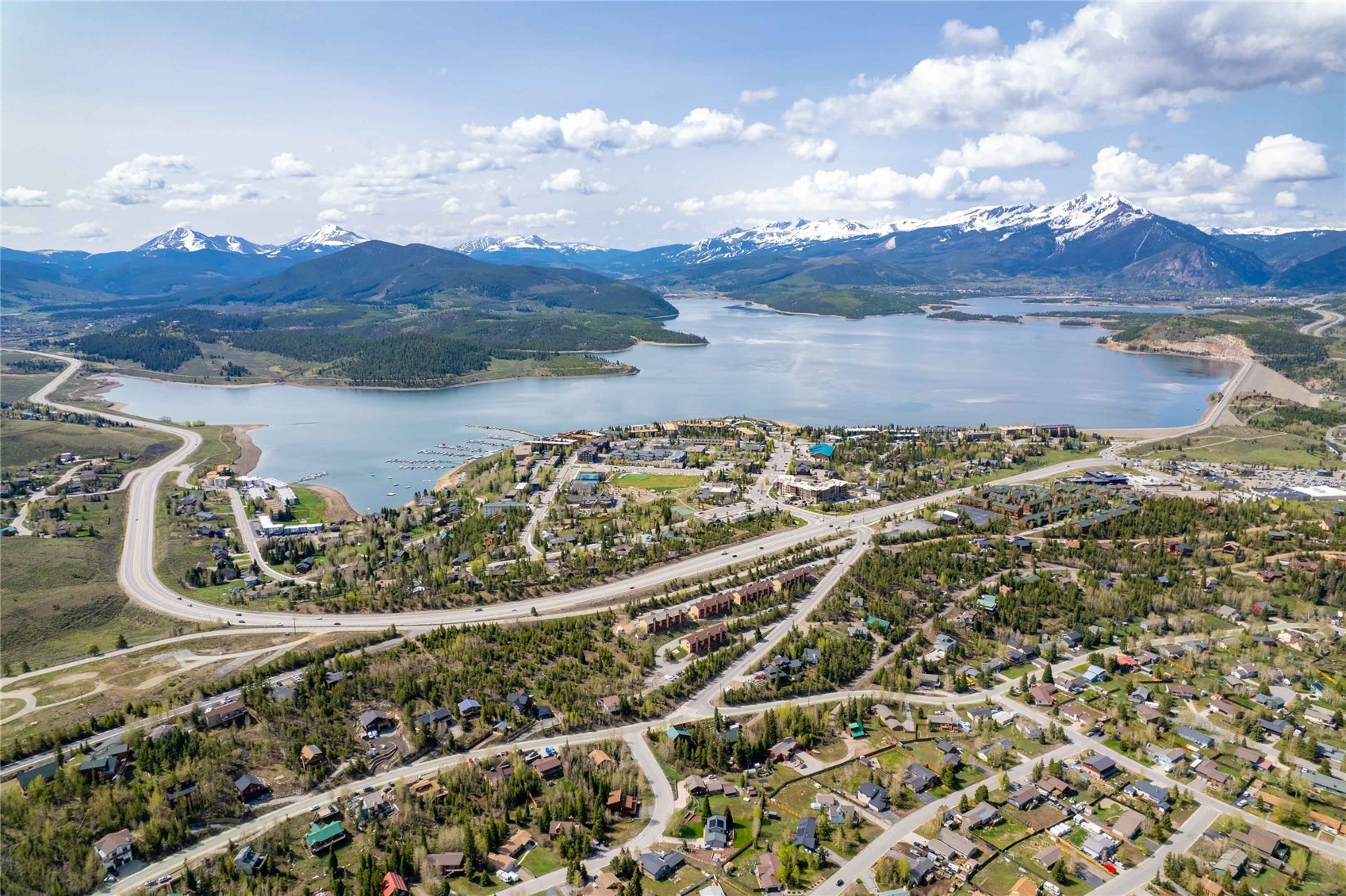 180 Evergreen Road, Unit 105 Dillon, CO 80435 - Photo 22 of 24 a view of a lake in middle of the town