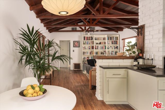 a kitchen with a sink and a stove