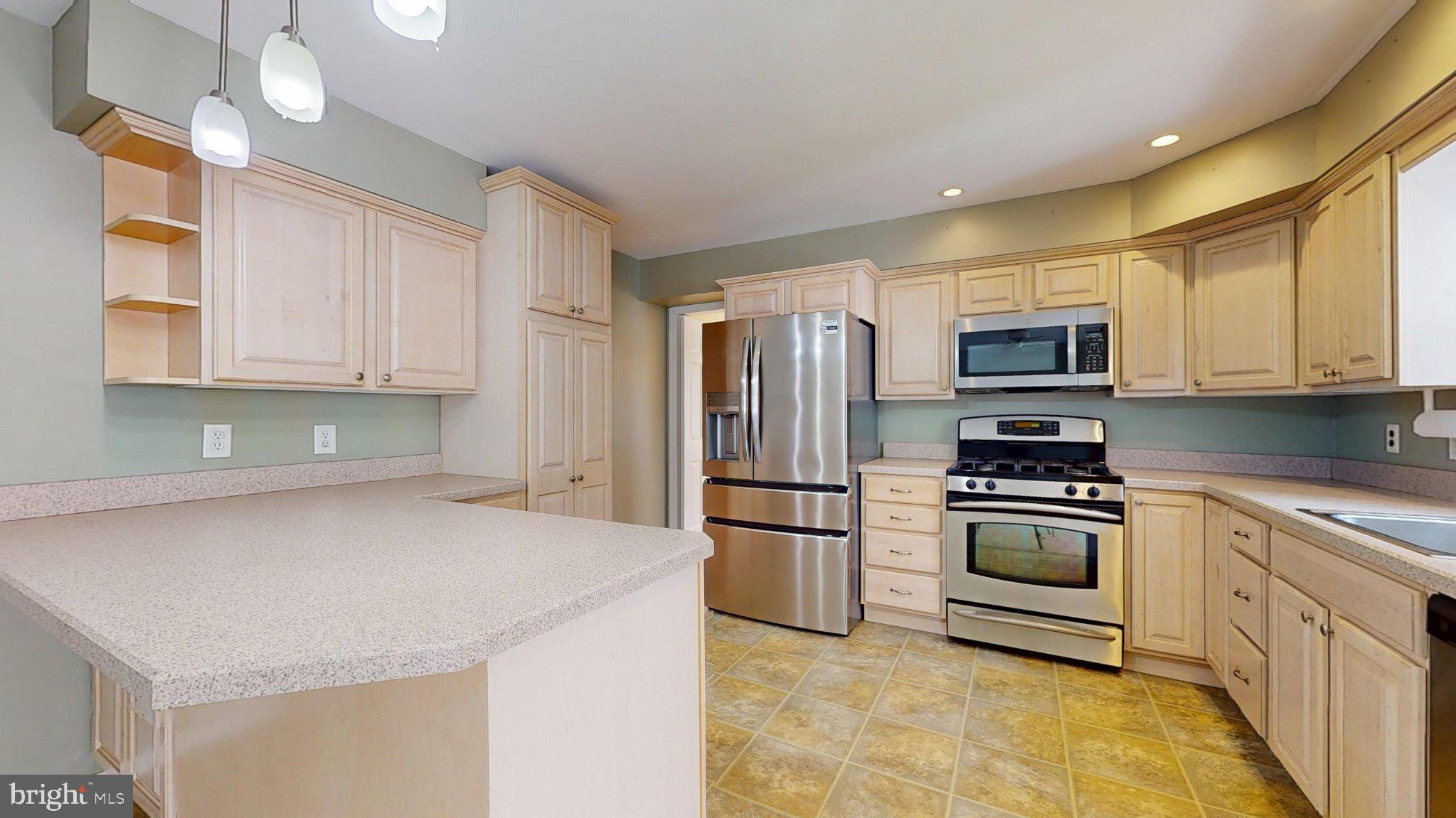 7 Pin Oak Trail Medford, NJ 08055 - Photo 6 of 38 Modern kitchen with warm wood tones.