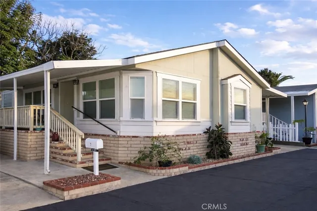 front view of a house with a small yard