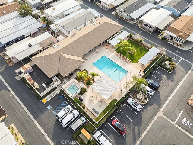 an aerial view of a residential apartment building with a front door