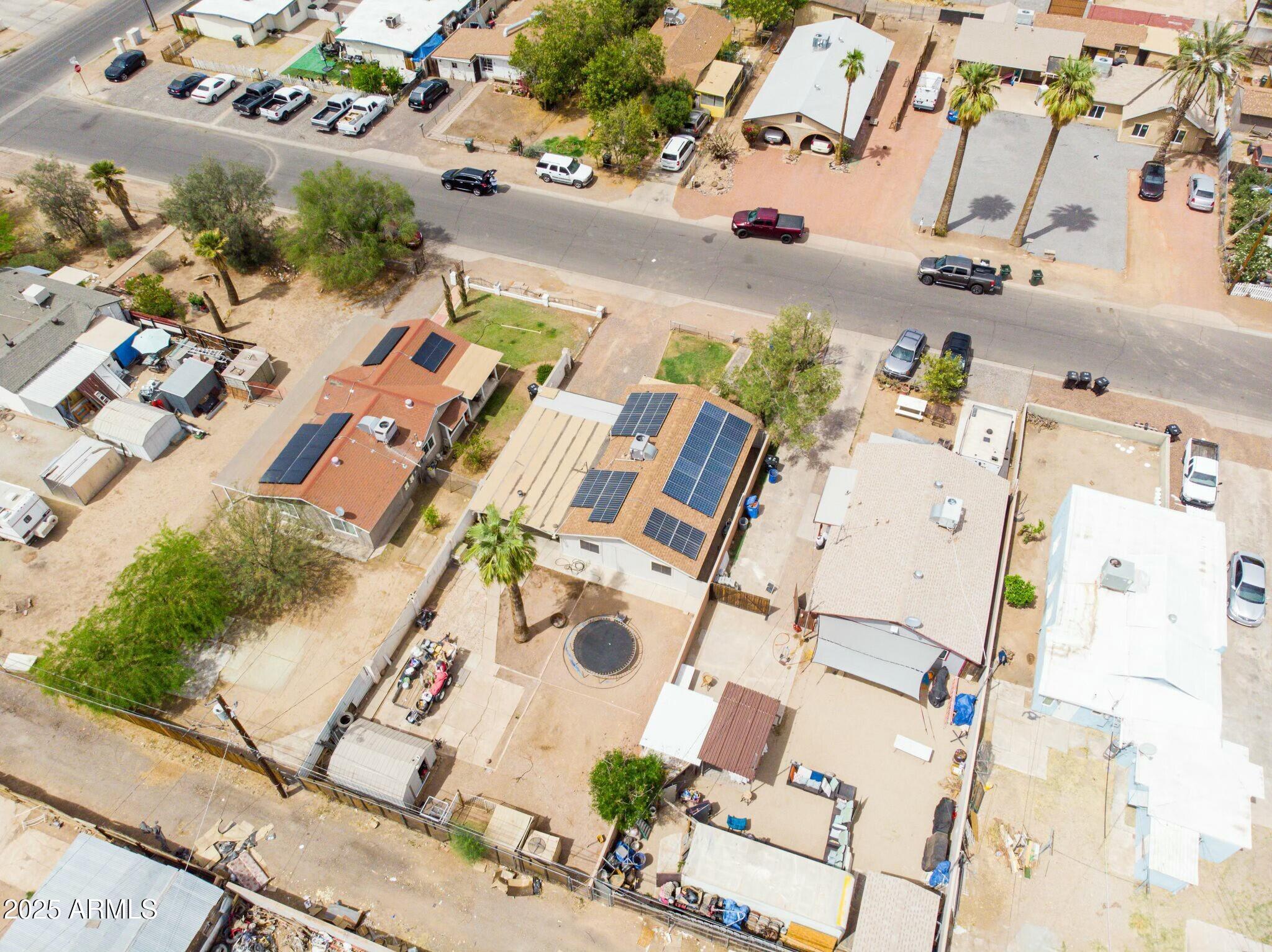 2929 West Granada Road Phoenix, AZ 85009 - Photo 27 of 28 an aerial view of a house with a yard and pool