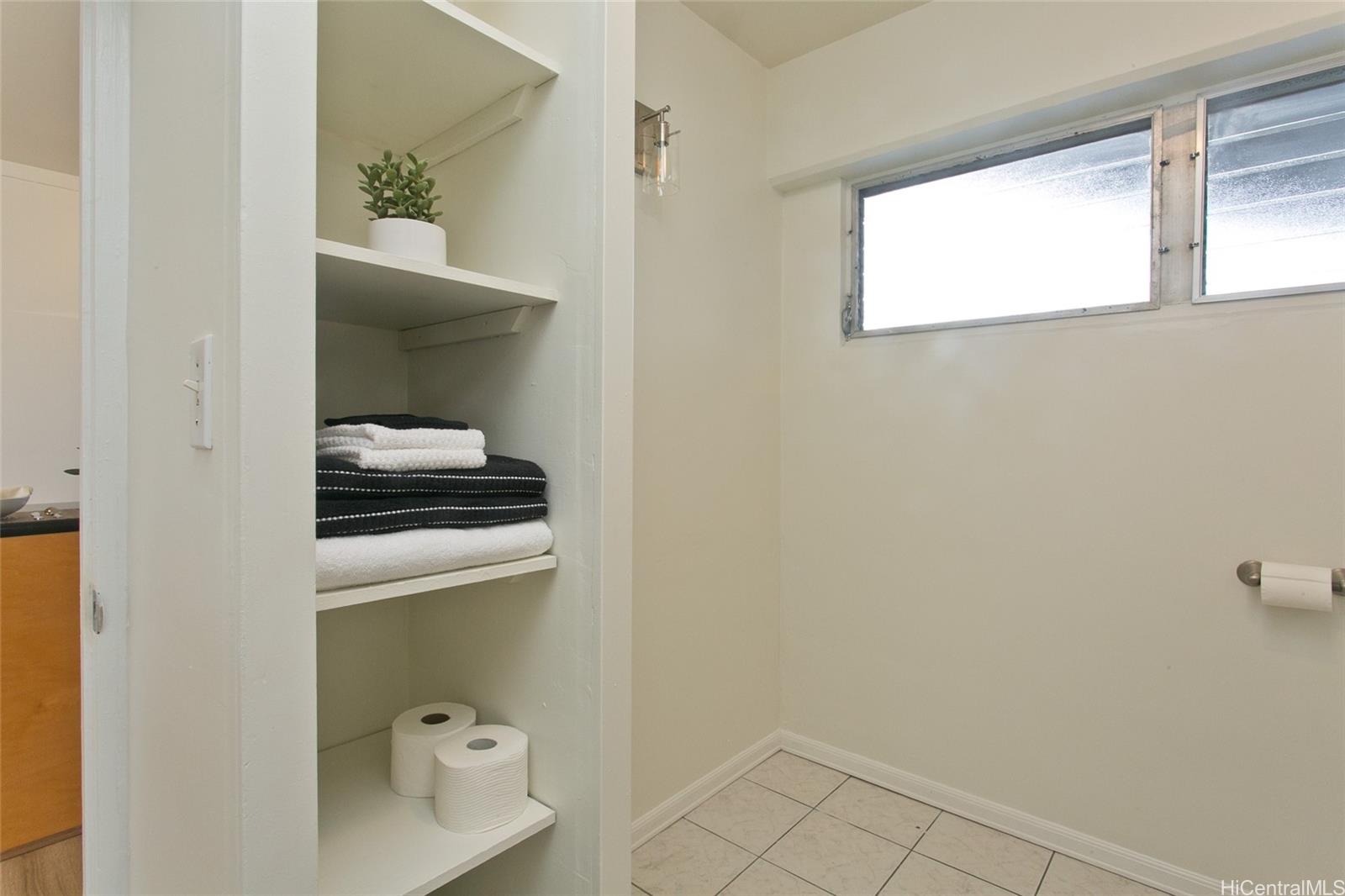 909 University Avenue, Unit 211 Honolulu, HI 96826 - Photo 9 of 10 a view of kitchen and utility room