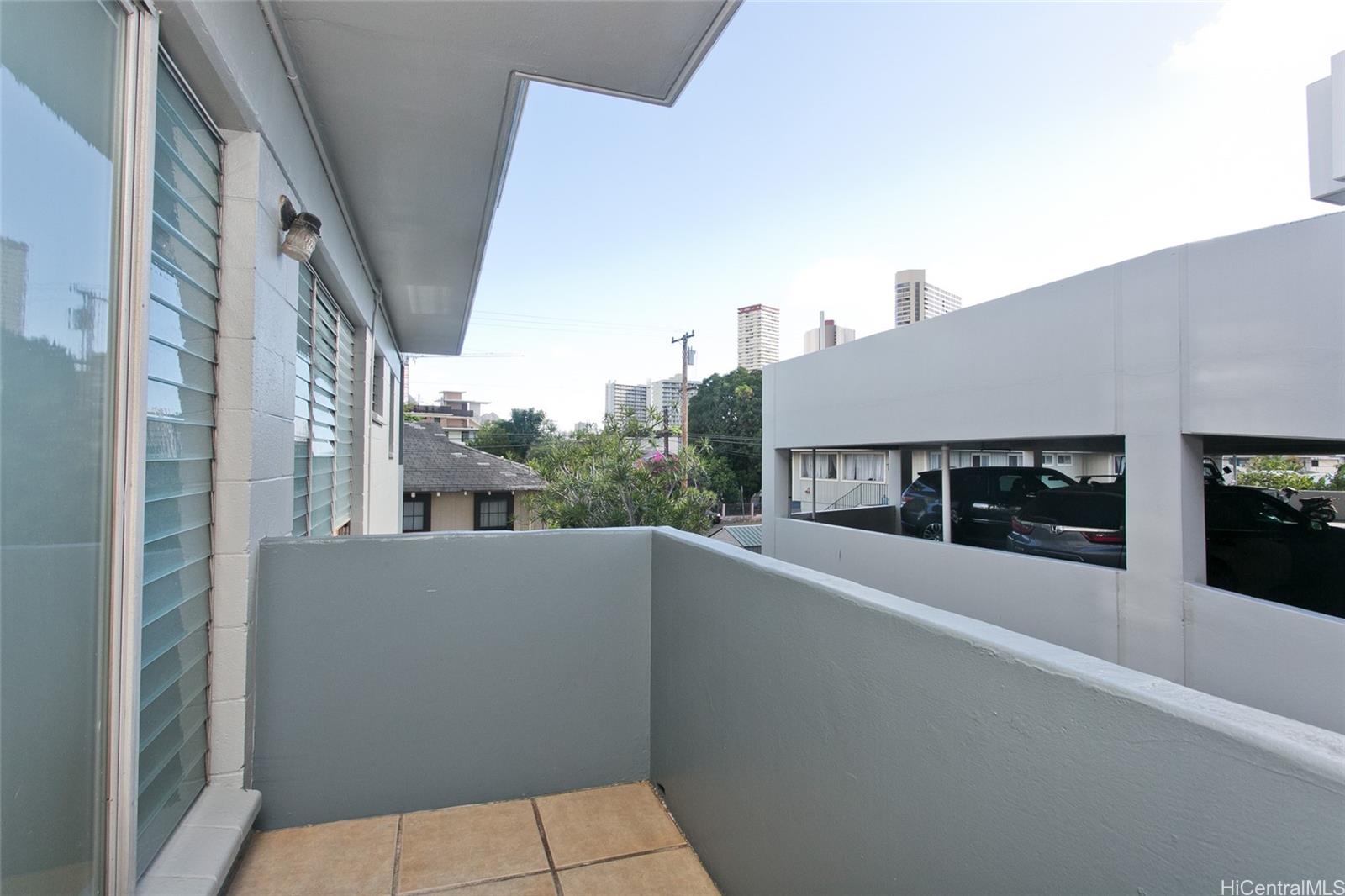 909 University Avenue, Unit 211 Honolulu, HI 96826 - Photo 10 of 10 a view of a house with a balcony