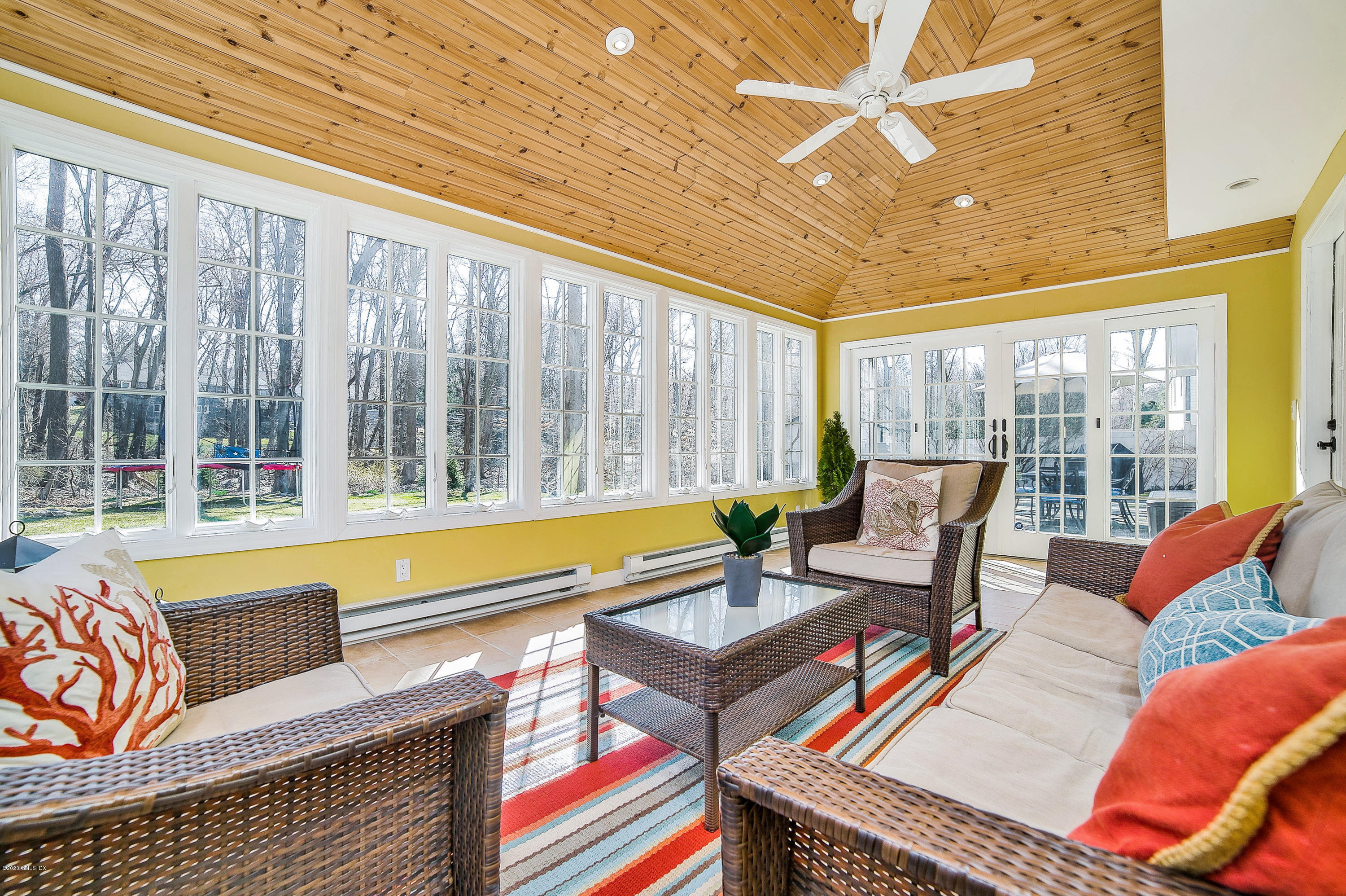 73 Malvern Road Stamford, CT 06905 - Photo 11 of 25 a living room with furniture and a large window