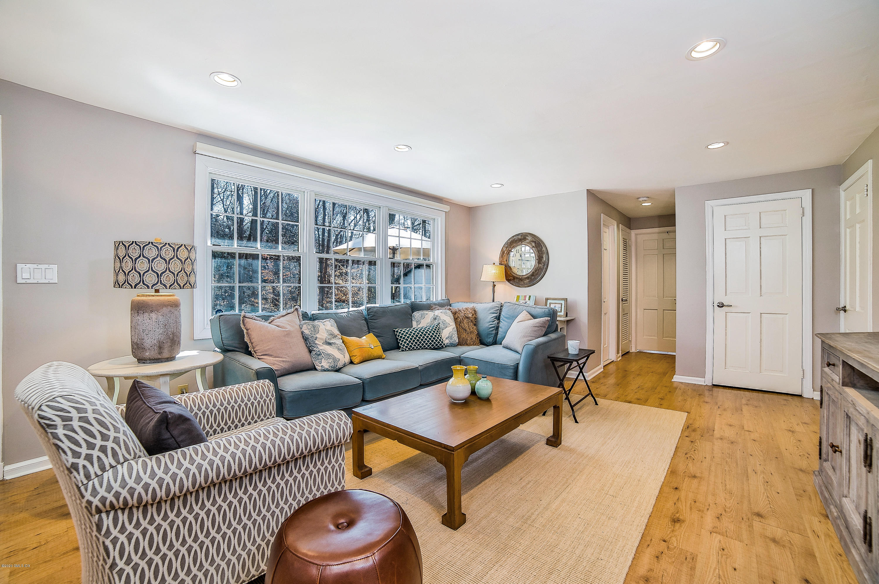 73 Malvern Road Stamford, CT 06905 - Photo 12 of 25 a living room with furniture and a rug