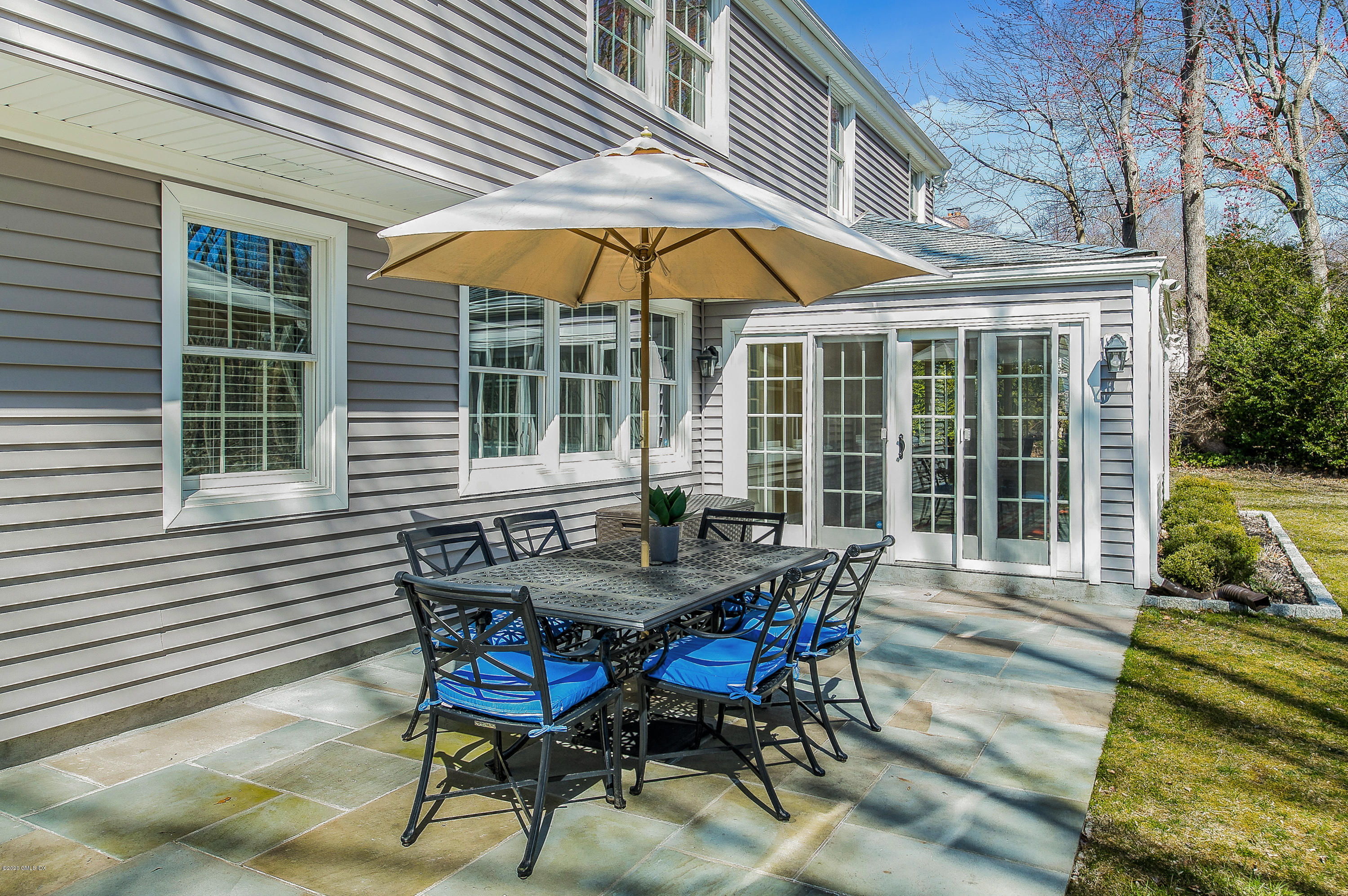73 Malvern Road Stamford, CT 06905 - Photo 18 of 25 a view of a house with backyard and sitting area
