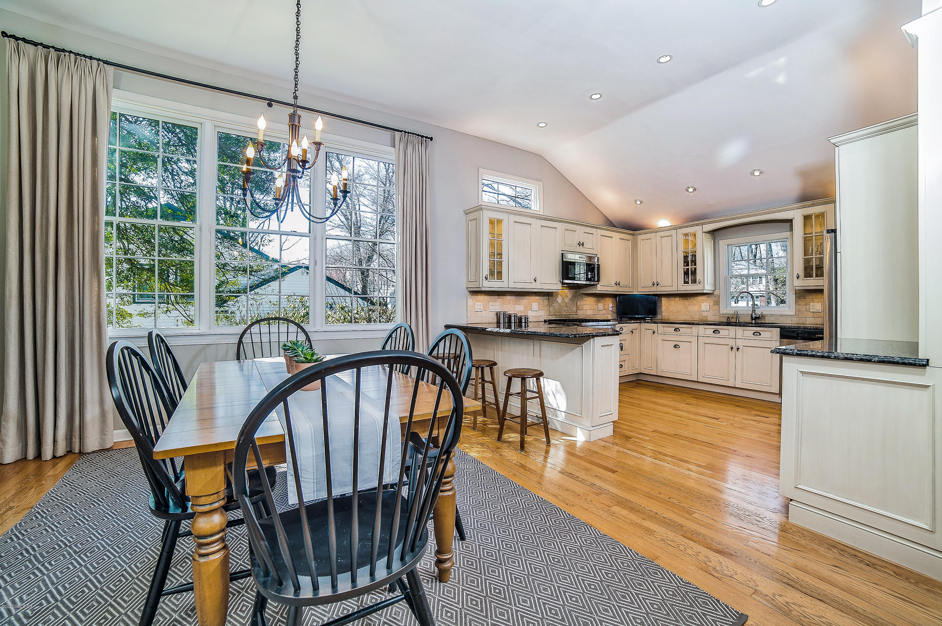 73 Malvern Road Stamford, CT 06905 - Photo 3 of 25 a view of a dining room with furniture window and wooden floor