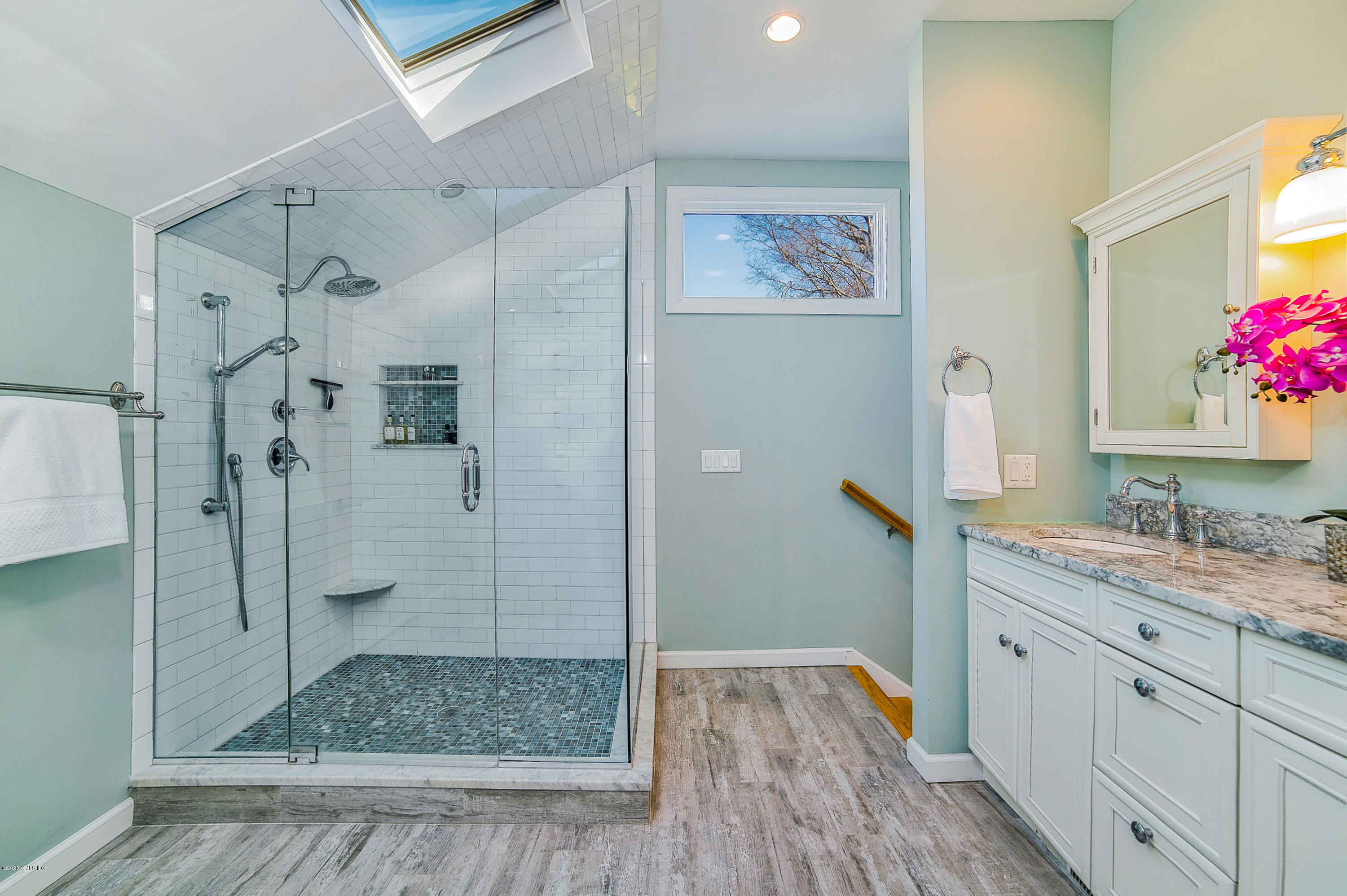 73 Malvern Road Stamford, CT 06905 - Photo 6 of 25 a bathroom with a granite countertop shower sink and mirror