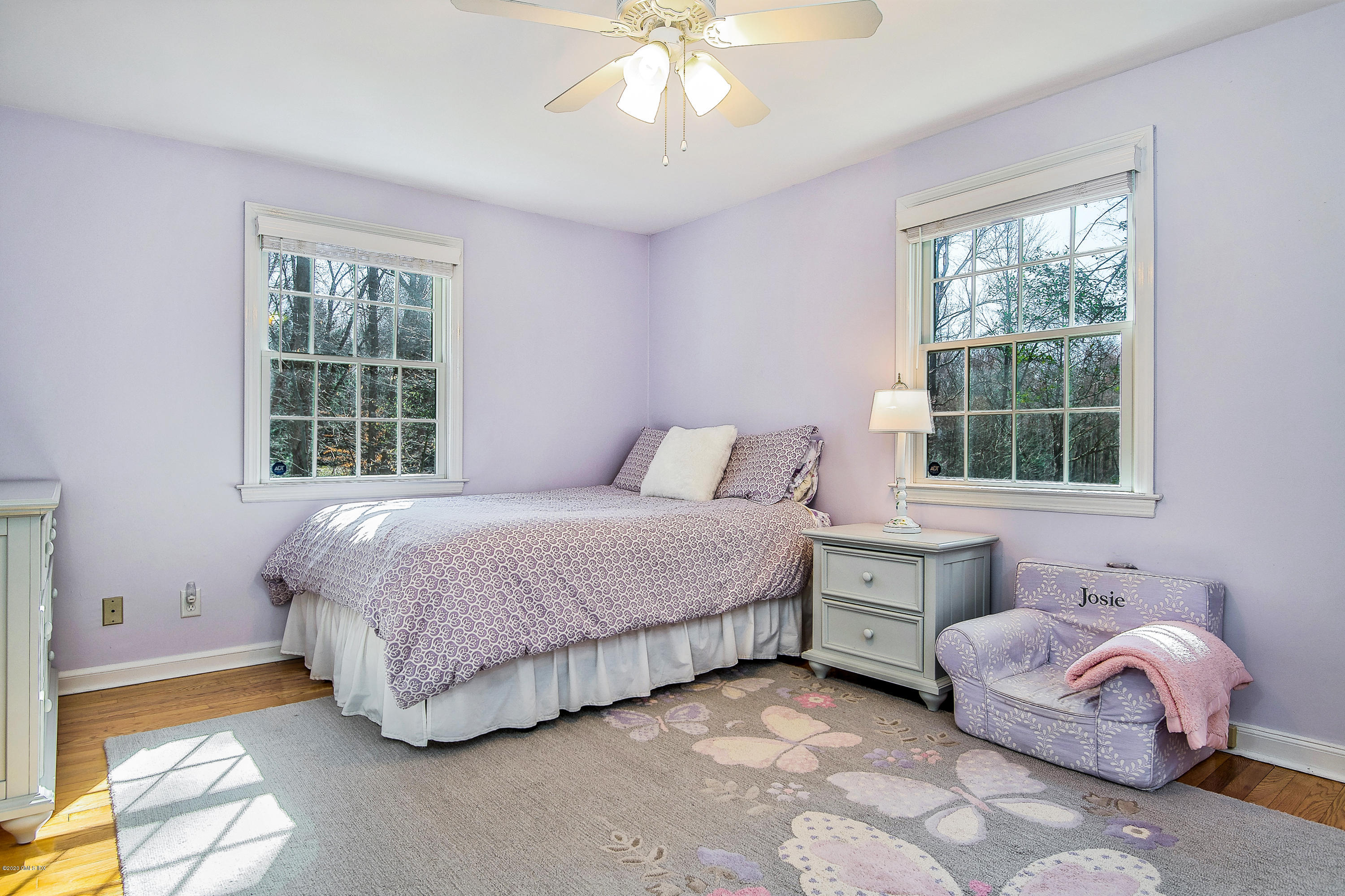 73 Malvern Road Stamford, CT 06905 - Photo 9 of 25 a bedroom with a bed and a window
