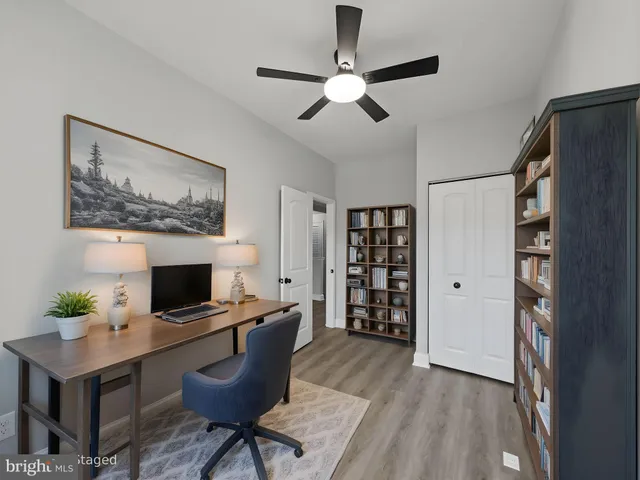 a workspace with furniture and window