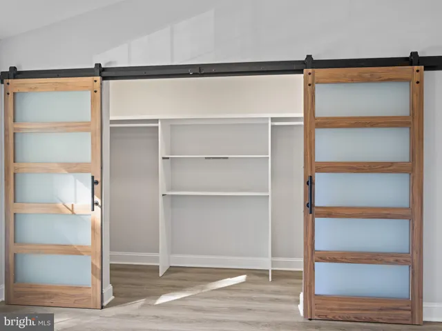 a view of an empty walk in closet