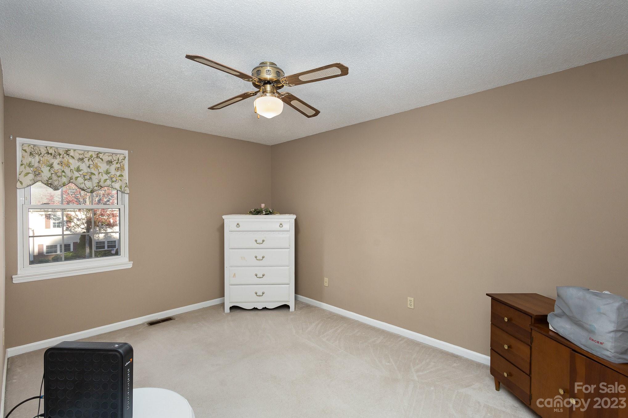 10927 Park Road Charlotte, NC 28226 - Photo 22 of 28 a view of an empty room with a window