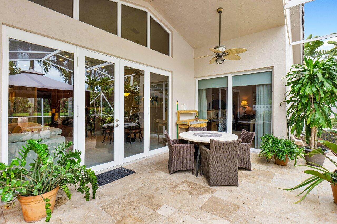 9031 Long Lake Palm Drive Boca Raton, FL 33496 - Photo 28 of 53 a view of a lobby with a potted plant