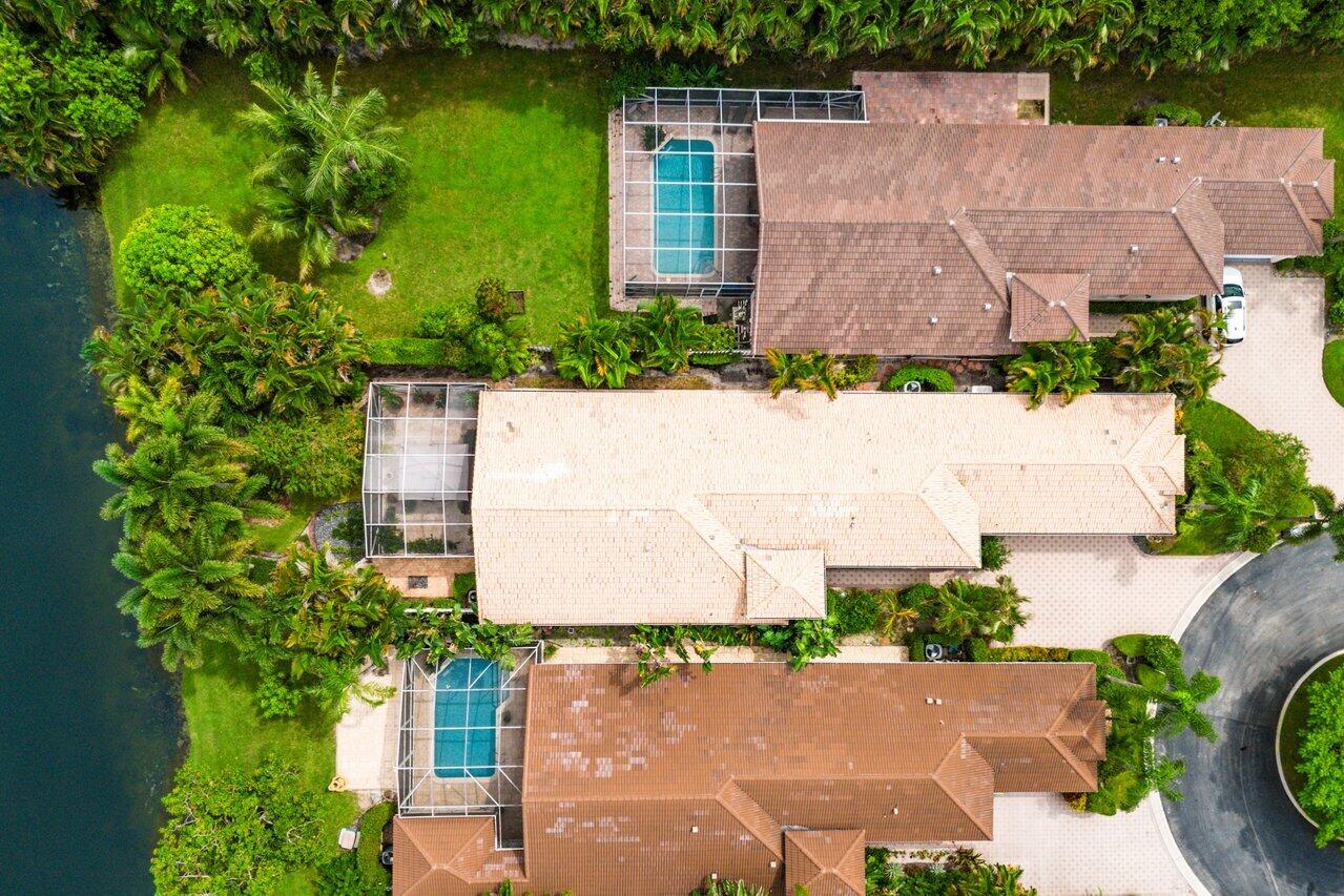 9031 Long Lake Palm Drive Boca Raton, FL 33496 - Photo 36 of 53 an aerial view of a house with outdoor space and lake view