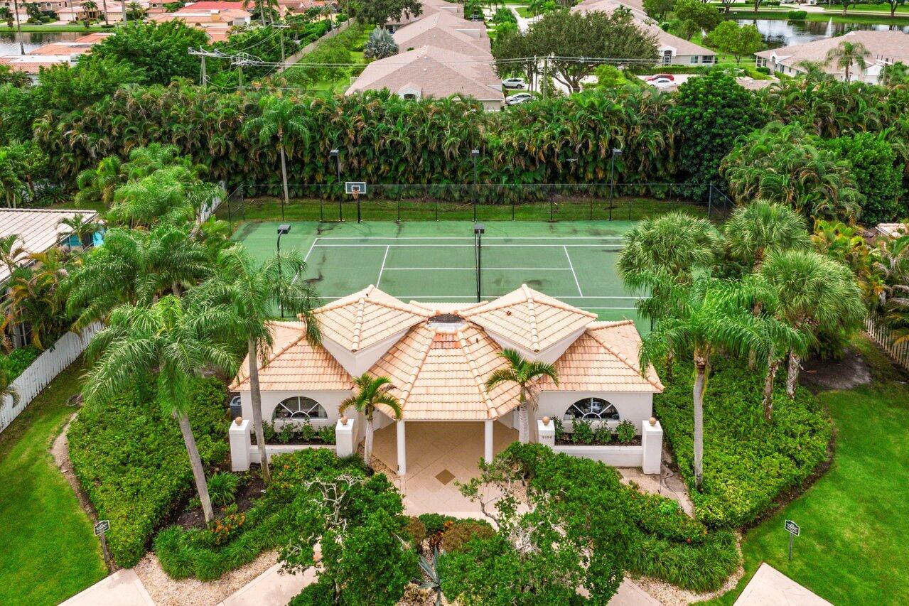 9031 Long Lake Palm Drive Boca Raton, FL 33496 - Photo 51 of 53 an aerial view of a house with a big yard