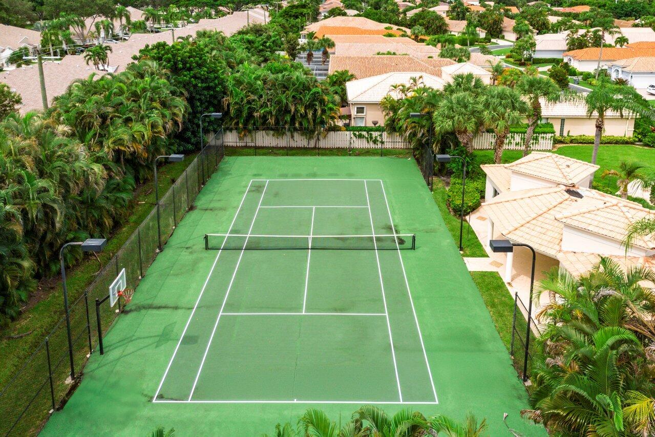 9031 Long Lake Palm Drive Boca Raton, FL 33496 - Photo 52 of 53 a view of an outdoor space and tennis court