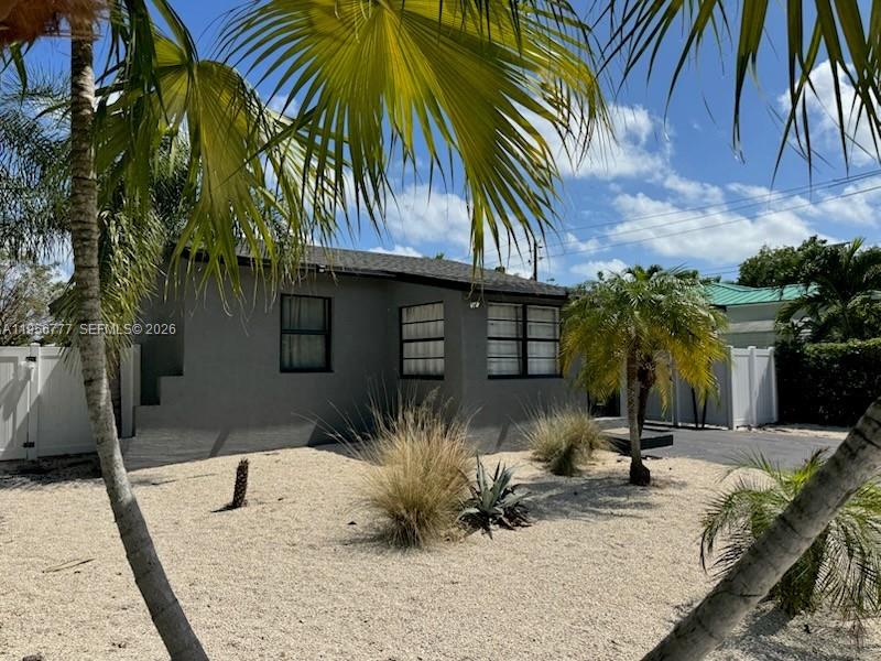 1401 Southwest 3rd Avenue Dania Beach, FL 33004 - Photo 2 of 13 a view of a house with a patio