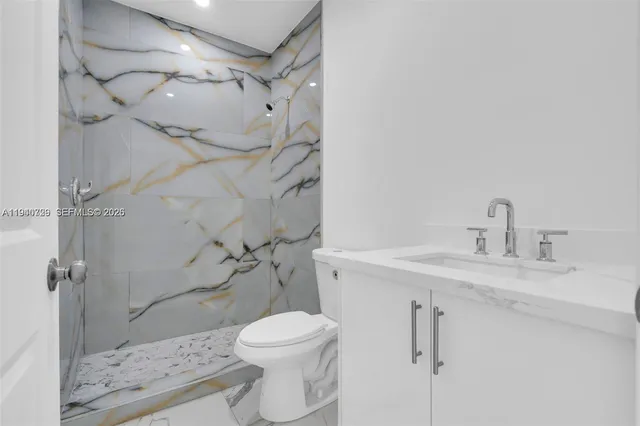 a view of yard with swimming pool and green space