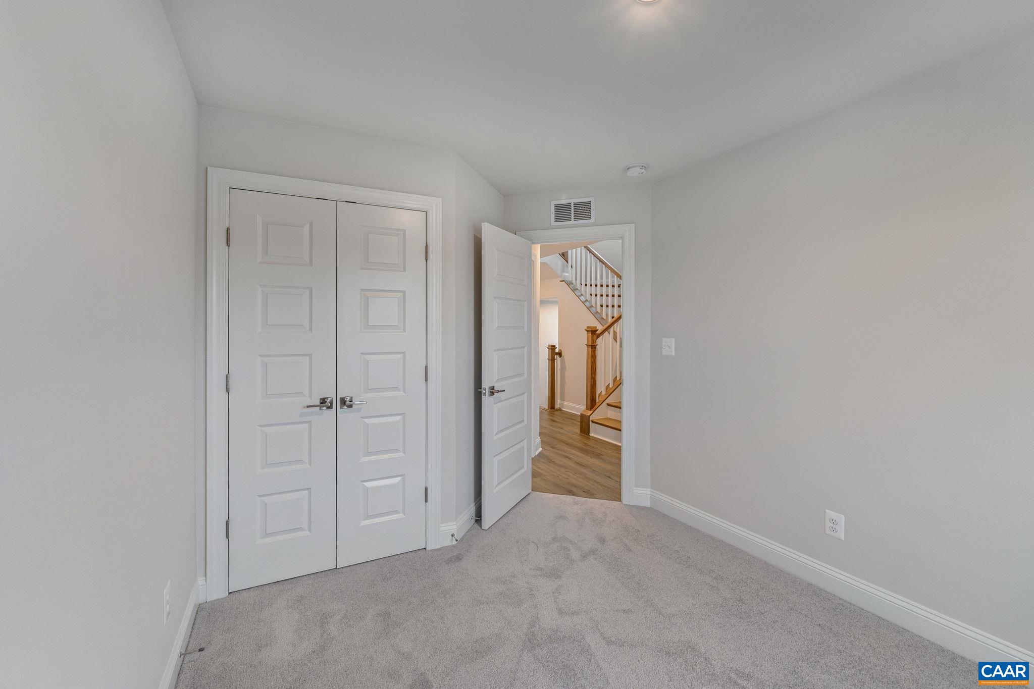 2237 Woodburn Road Charlottesville, VA 22901 - Photo 29 of 48 a view of an empty room and closet area