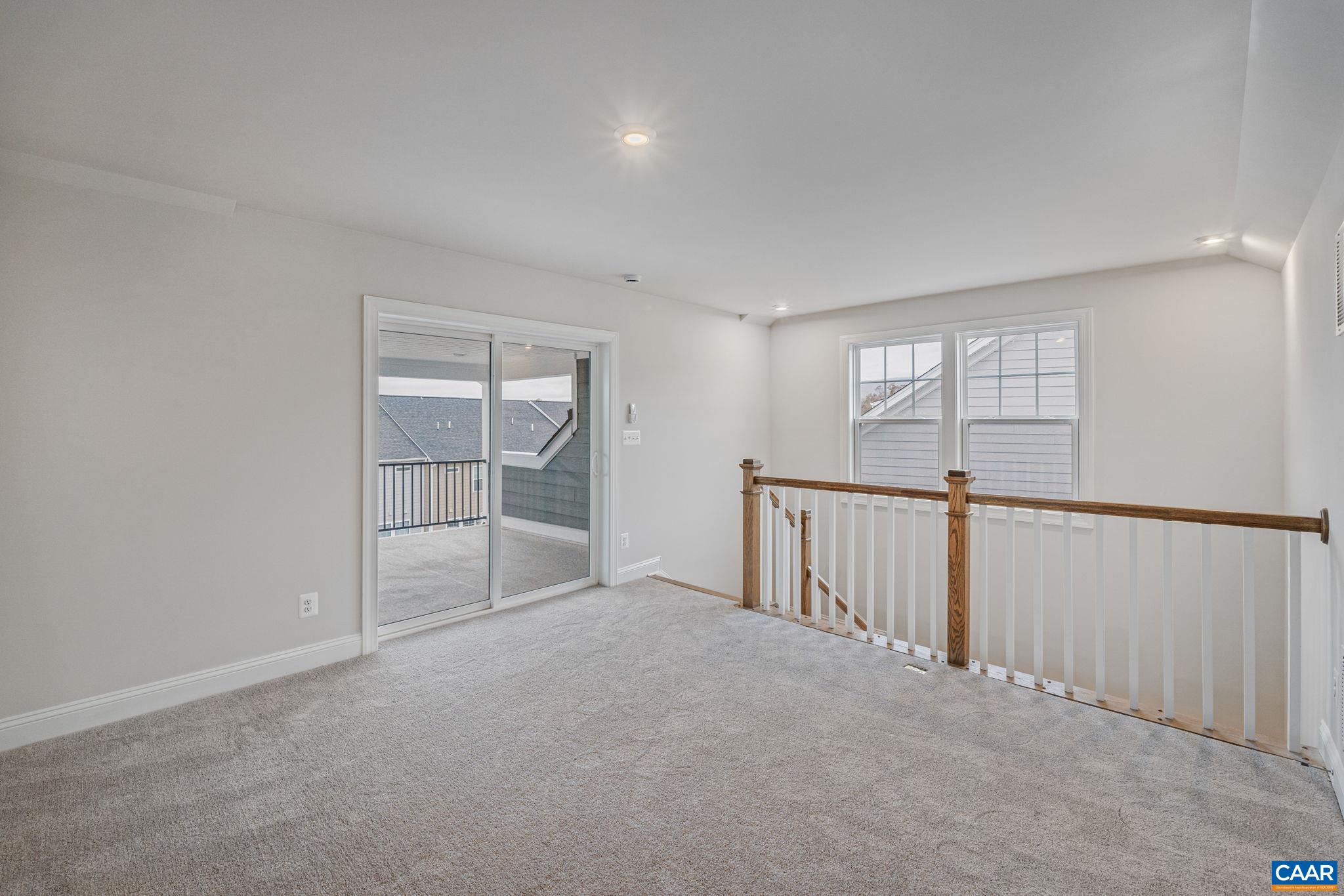 2237 Woodburn Road Charlottesville, VA 22901 - Photo 34 of 48 a view of an empty room with a window