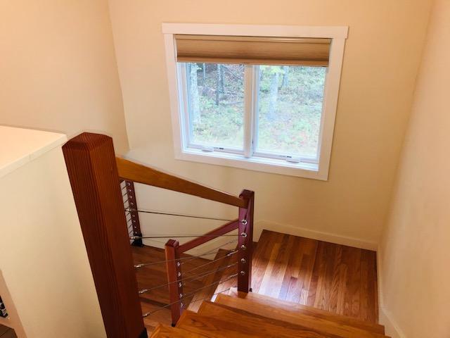 1329 Newbury Neck Road Surry, ME 04684 - Photo 24 of 35 Fir floors & treads.