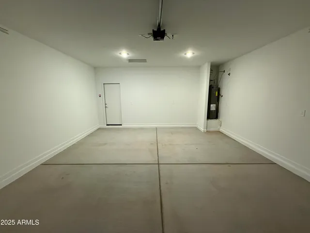 a utility room with washer and dryer