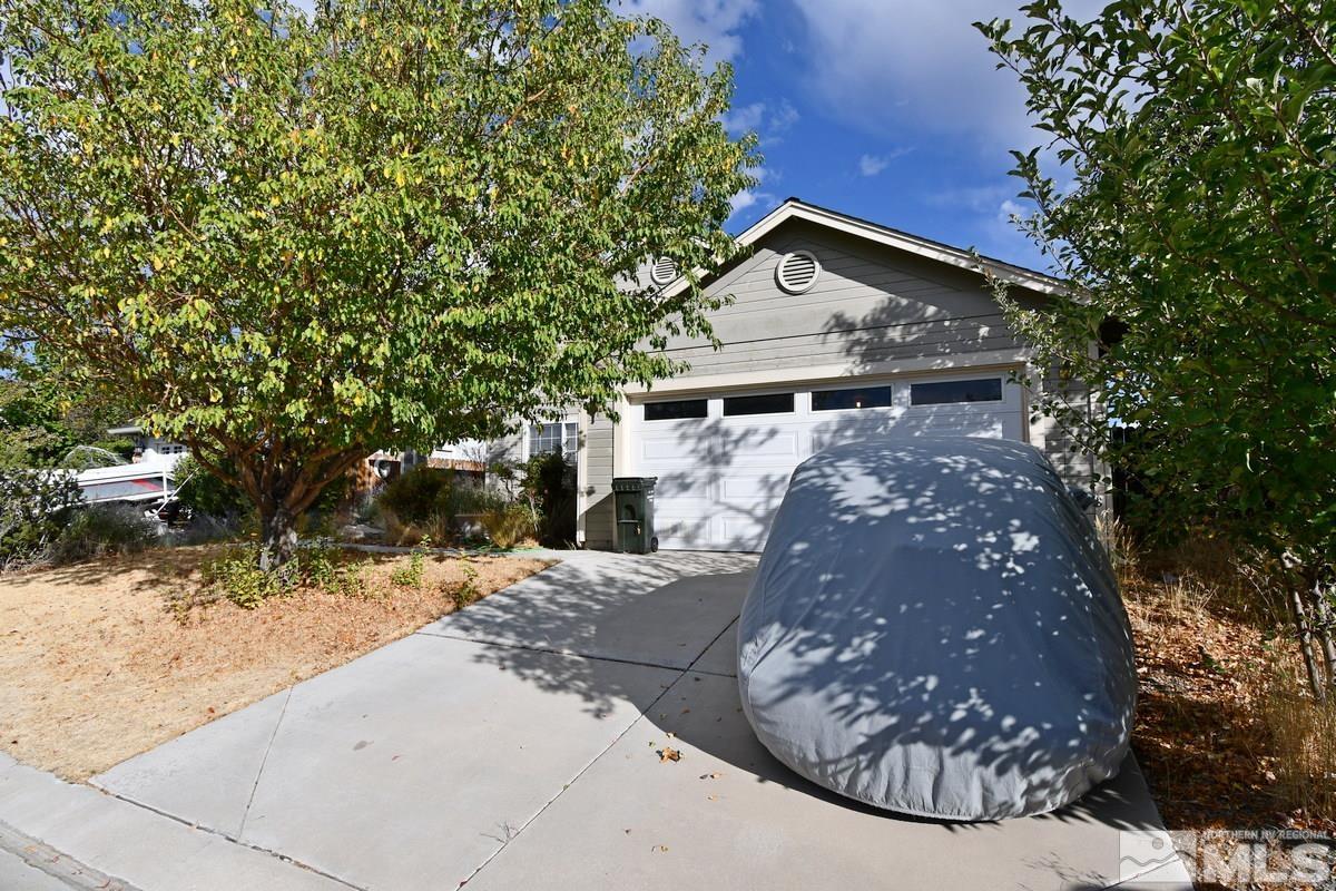 8 Conner Way Gardnerville, NV 89410 - Photo 3 of 6 a view of a house with a tree
