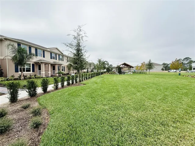 a picture of a park with a bench