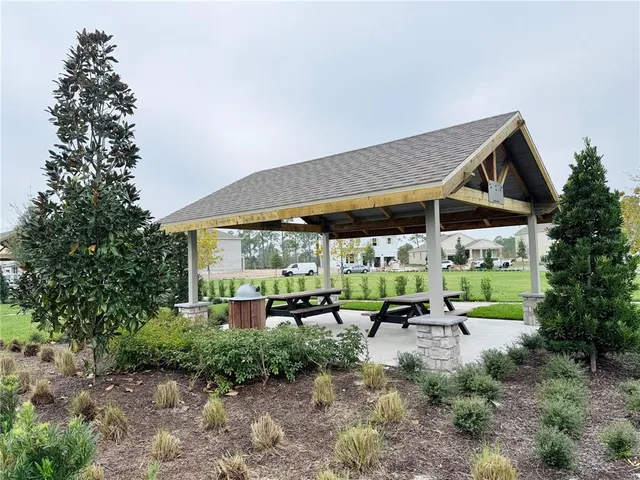 a group of cars parked in front of a house