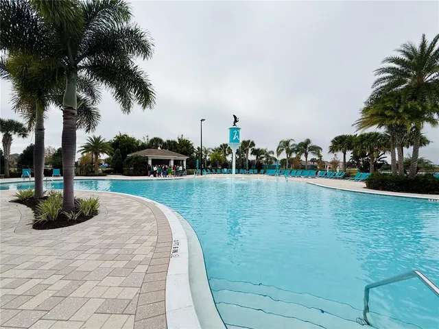 a view of a kitchen with a large window