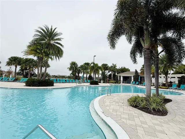 a living room with patio furniture