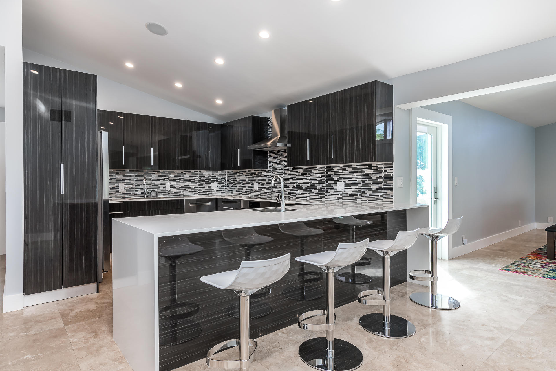 21596 Redbay Road Boca Raton, FL 33433 - Photo 6 of 19 a kitchen with a table and chairs in it