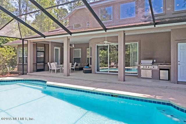 11766 Mandarin Road Jacksonville, FL 32223 - Photo 14 of 20 a view of a house with a patio
