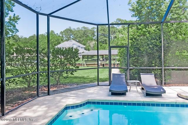 11766 Mandarin Road Jacksonville, FL 32223 - Photo 17 of 20 a view of a deck with a garden view