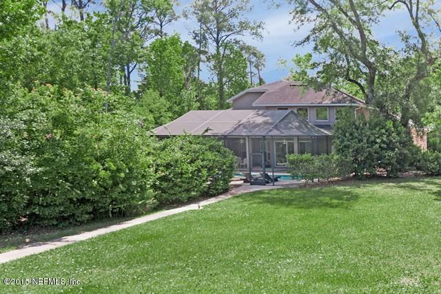 11766 Mandarin Road Jacksonville, FL 32223 - Photo 18 of 20 a view of a house with a yard and sitting area