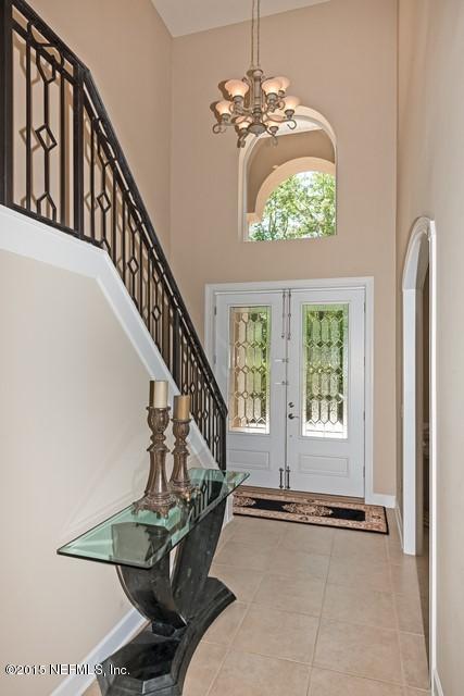 11766 Mandarin Road Jacksonville, FL 32223 - Photo 5 of 20 a view of an entryway with wooden floor