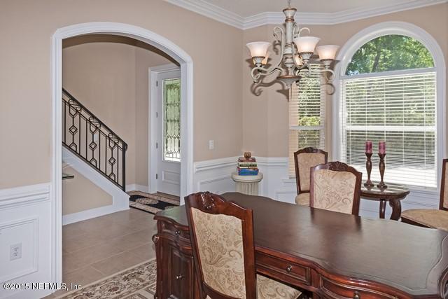 11766 Mandarin Road Jacksonville, FL 32223 - Photo 6 of 20 a view of a dining room with furniture window and wooden floor