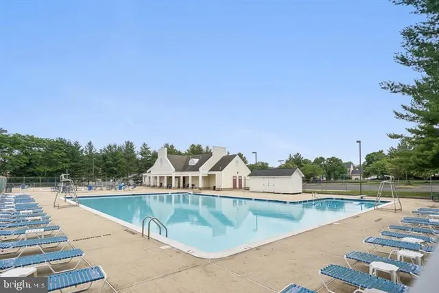 a view of a swimming pool with a lake