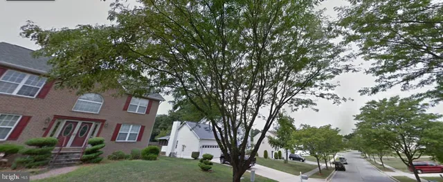 a view of a building with a tree