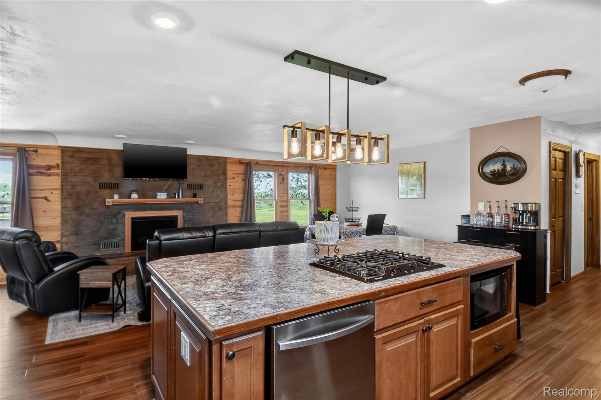3949 West Burns Line Road Brown City, MI 48416 - Photo 15 of 70 Spacious kitchen island featuring a built-in cooktop, dishwasher, and microwave drawer