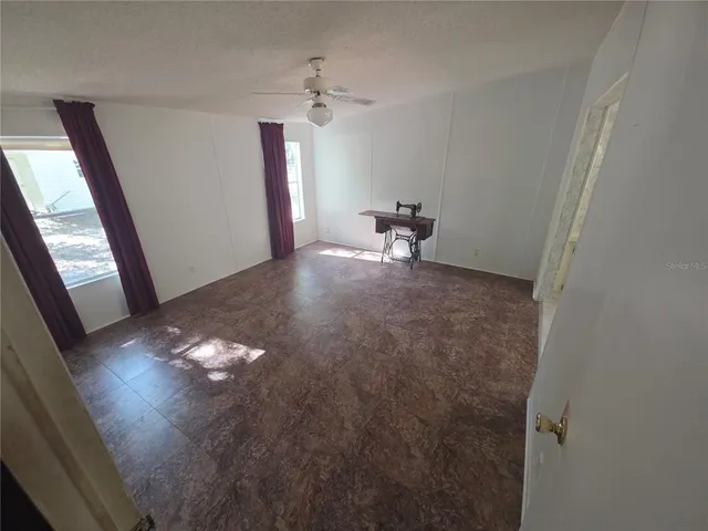 a view of a livingroom with furniture