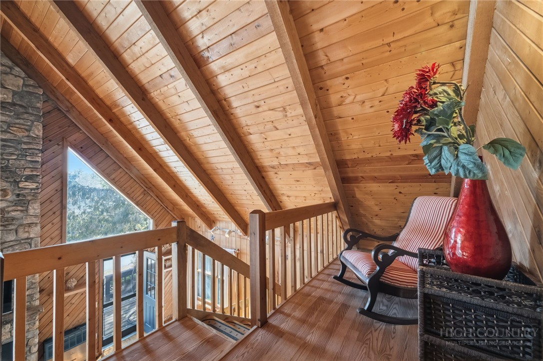 83 Pine Ridge Loop Newland, NC 28657 - Photo 16 of 32 a view of sitting area with furniture and wooden floor