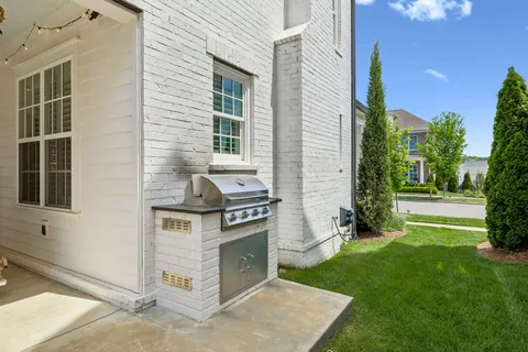 a view of a yard with an outdoor space