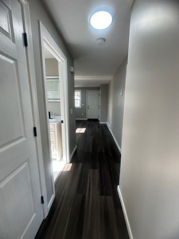 15-17 Otis Court, Unit 15 Springfield, MA 01119 - Photo 3 of 16 a view of a hallway from a hallway