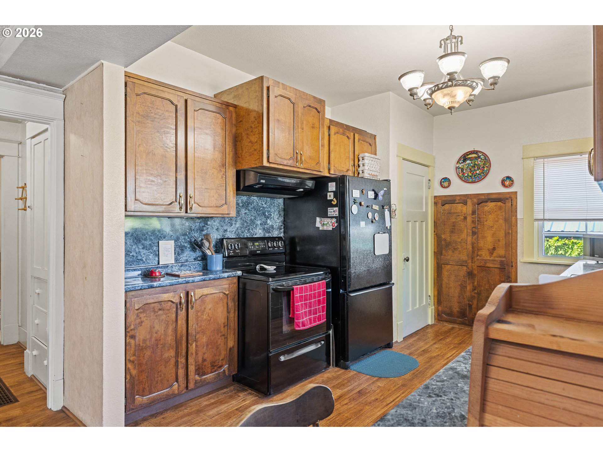 208 7th Street Myrtle Point, OR 97458 - Photo 22 of 48 a kitchen with stainless steel appliances granite countertop a refrigerator a stove and a sink with dishwasher