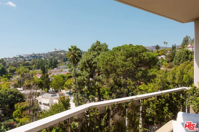 a view of a balcony with an outdoor space